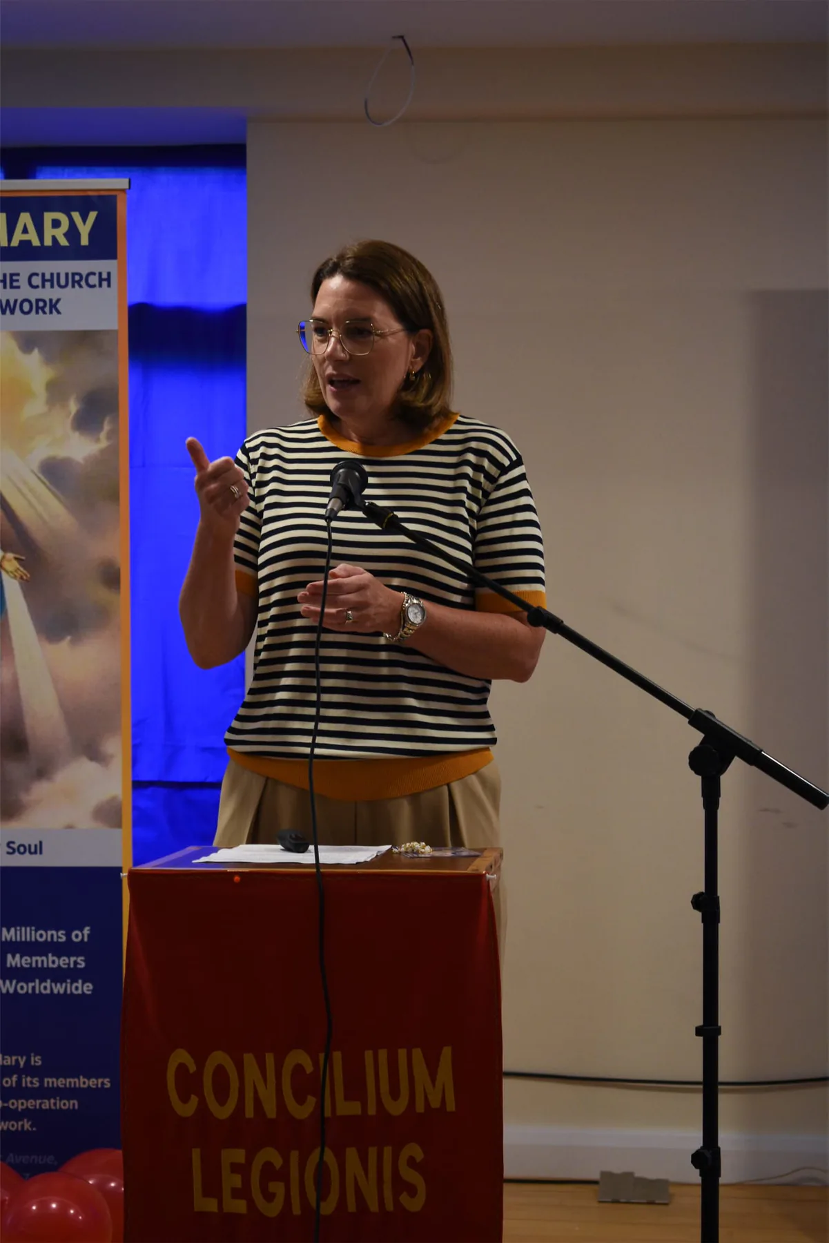 A speaker at the lectern during one of the morning talks