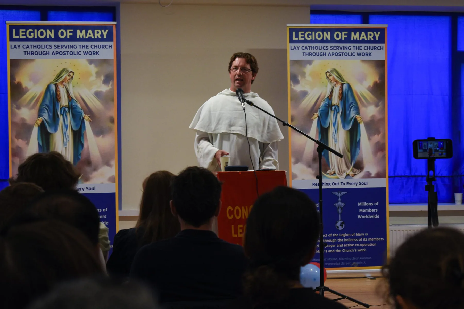 A Dominican friar giving the talk on Our Lady, Mediatrix of All Graces