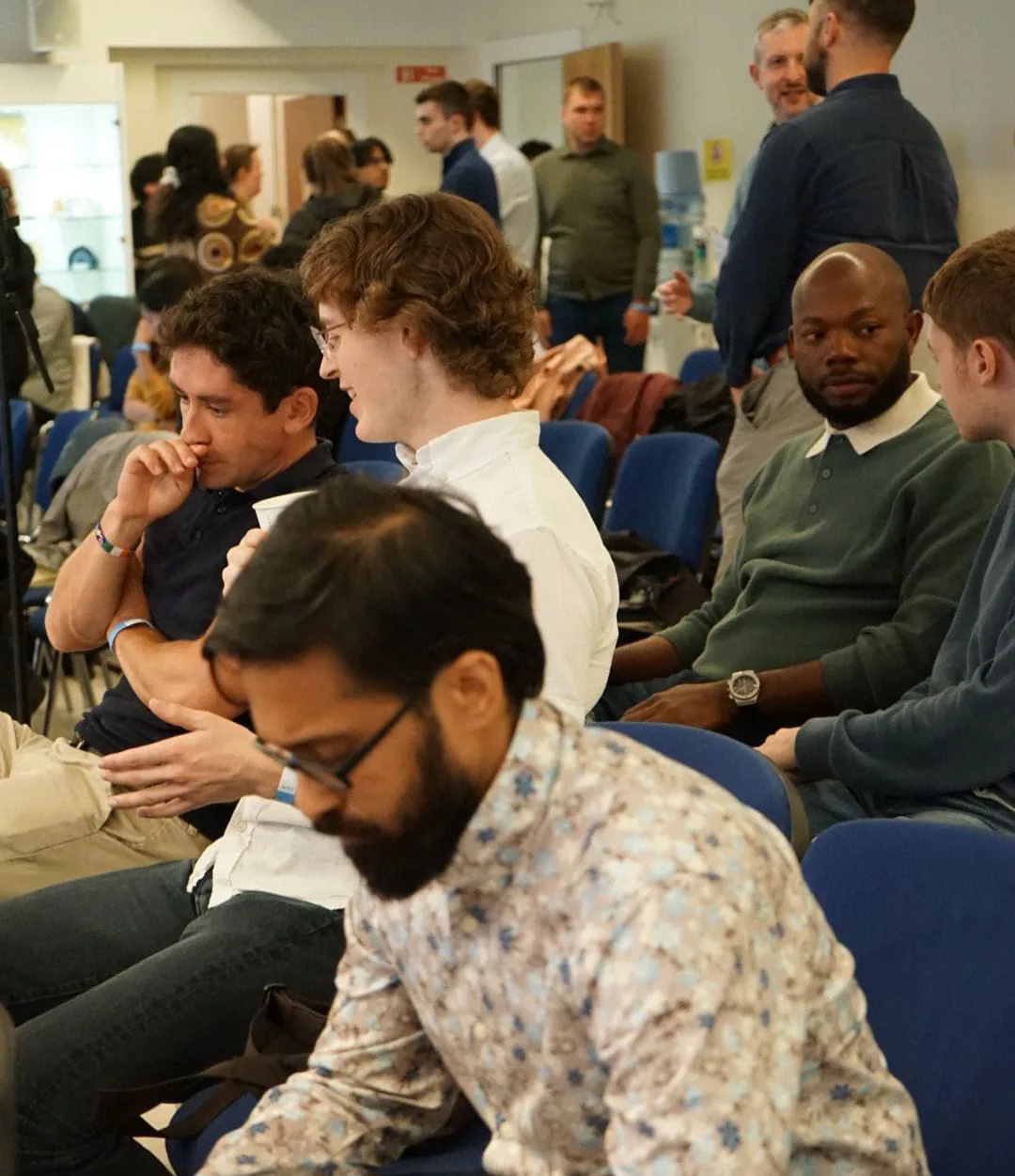 Young adults listening during a session