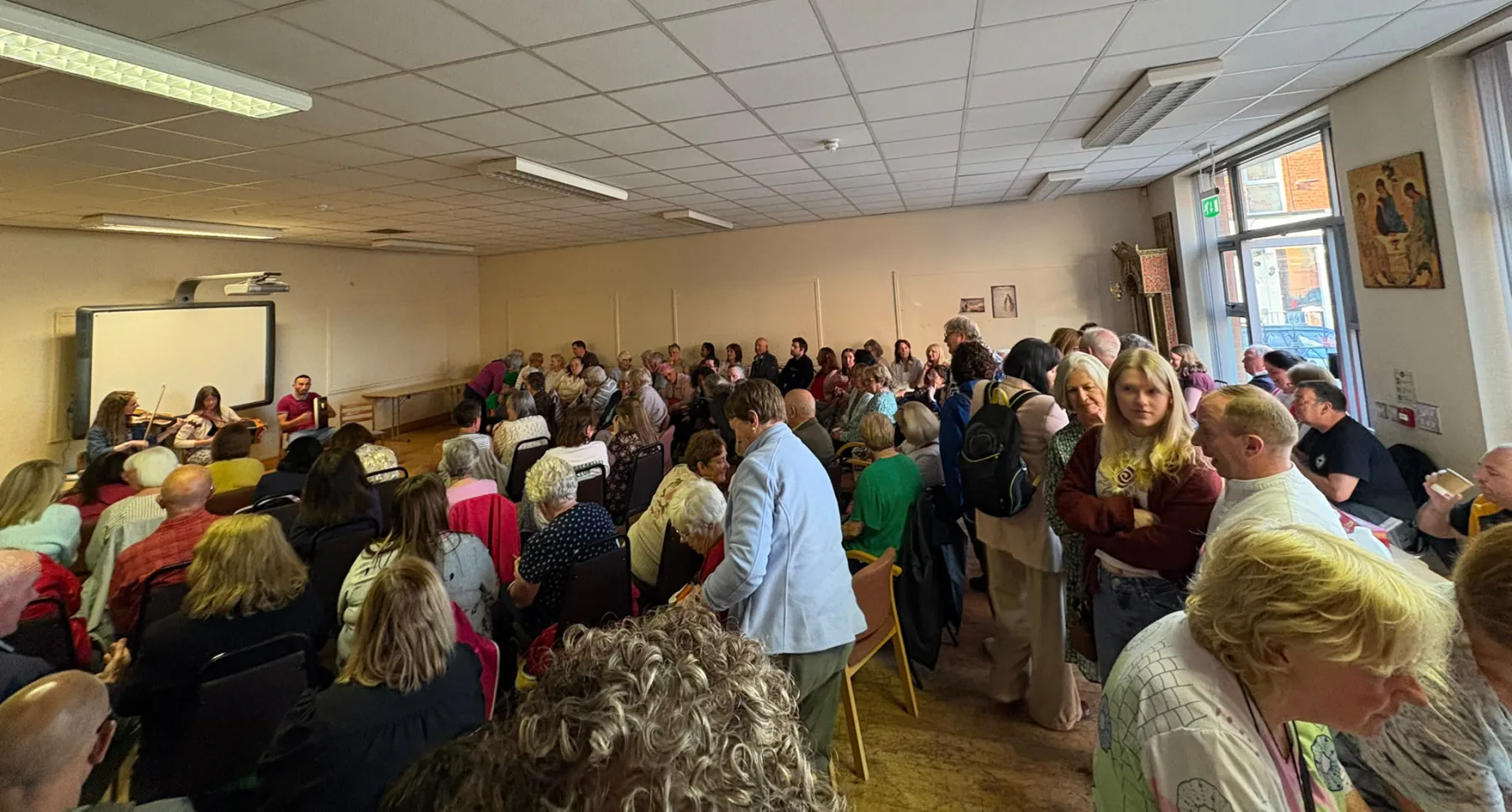The room filled past its capacity for The Story of Ireland, with people standing at the back