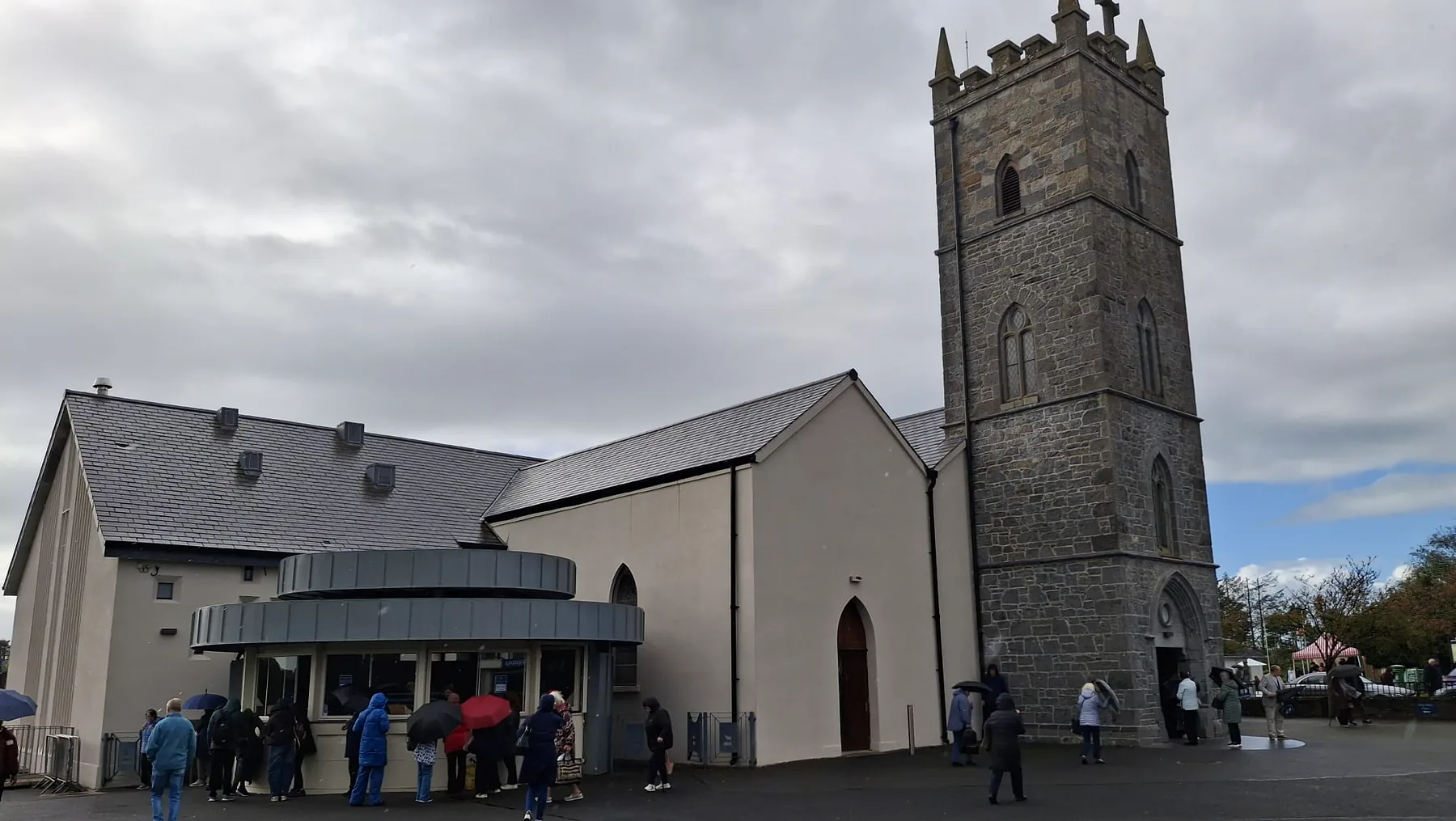 Pilgrims gathering at the old parish church of St John the Baptist, where the apparition was seen at the gable wall