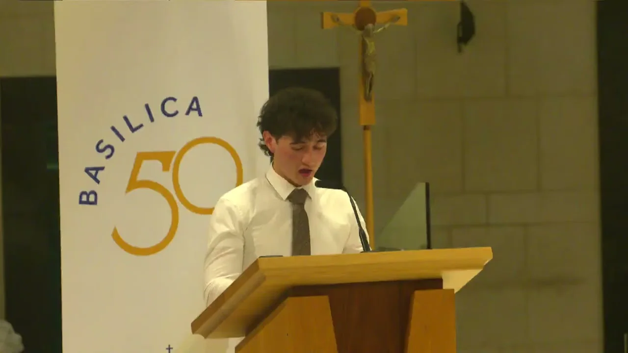 Mario Nunis speaking at a lectern in the Basilica at Knock Shrine